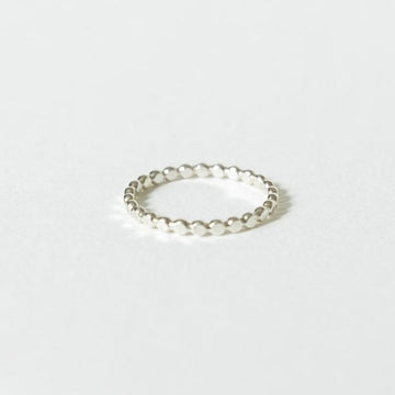 Sterling Silver beaded ring on white surface