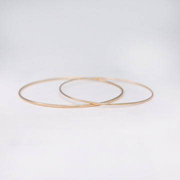 Thick and thin minimalist handmade 14k solid gold stacking bangles