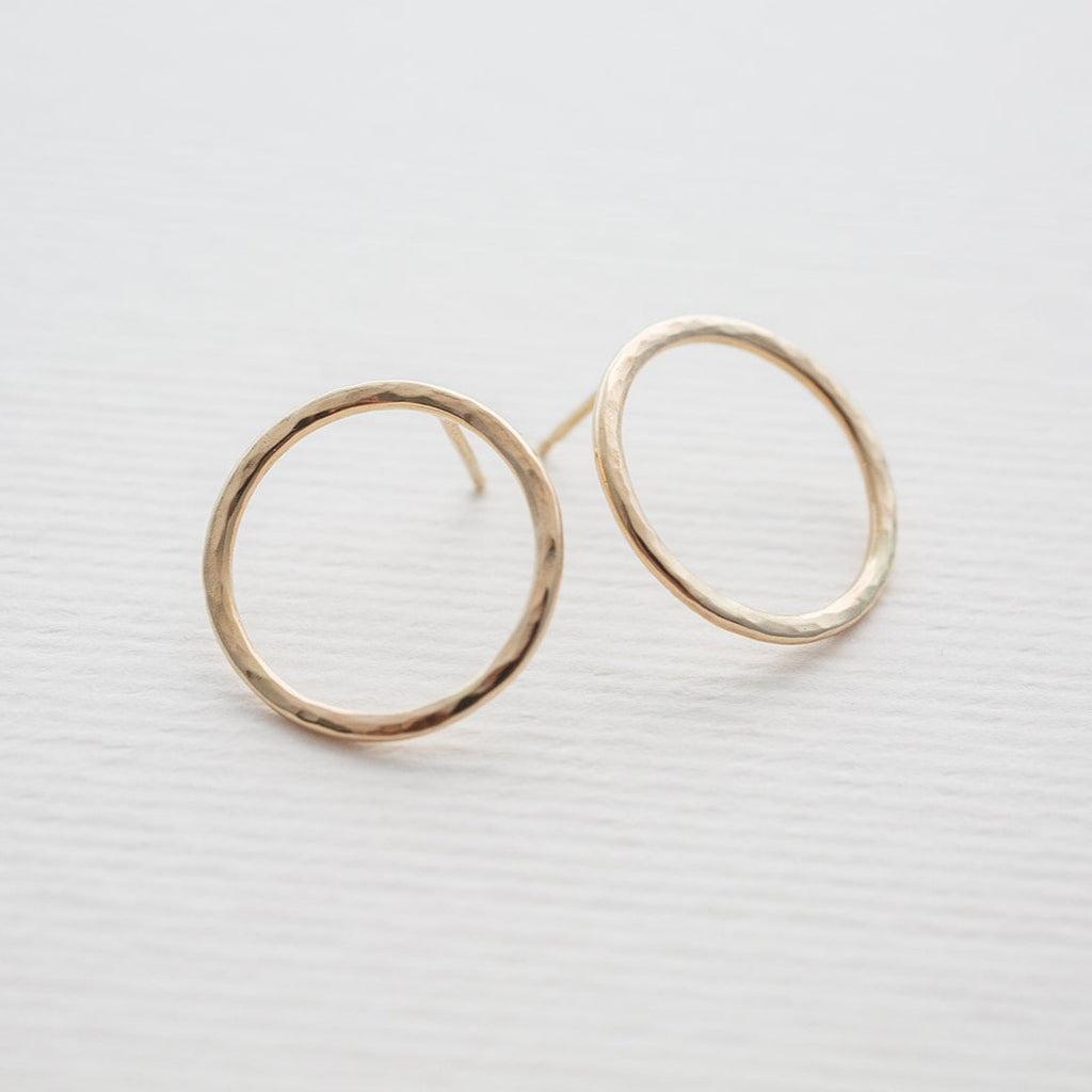 Handmade solid 14k gold 'Water Circle' stud earrings with a hammered finish