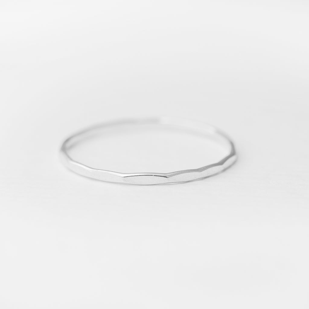 Minimalist handmade sterling silver faceted stacking ring 